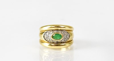 Lot 1064 - An 18ct yellow gold ring set with a central...