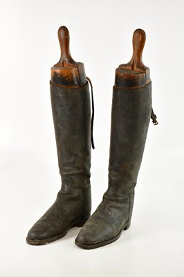 Lot 684 - A pair of black leather hunting boots with...