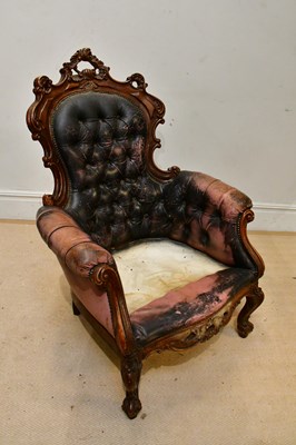 Lot 316 - A late Victorian style spoon back elbow chair,...