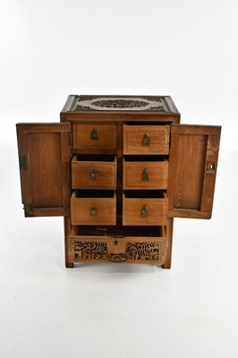 Lot 1359 - A Chinese Canton carved hardwood jewellery...