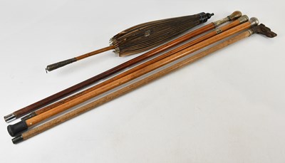 Lot 534 - Four early 20th century walking canes...