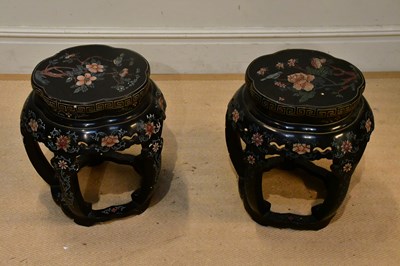 Lot 66 - A pair of Chinese lacquered drum occasional...