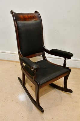 Lot 320 - A Victorian mahogany rocking chair.