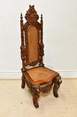 Lot 62 - A Continental reproduction carved hardwood...