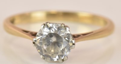 Lot 633 - A 9ct yellow gold platinum tipped solitaire...