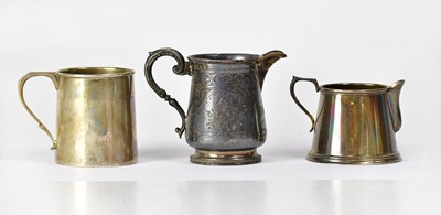 Lot 935 - A Victorian hallmarked silver footed jug with...