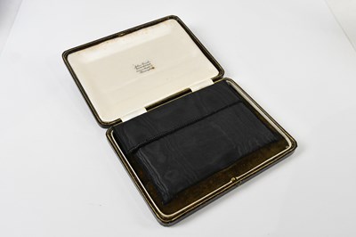 Lot 1200 - A 9ct yellow gold cigarette case of rounded...