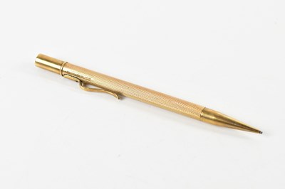 Lot 1231 - A 9ct gold cased propelling pencil, with name...