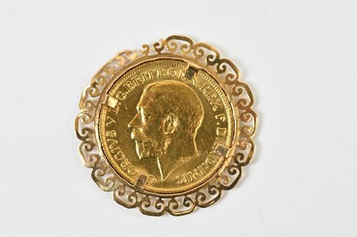 Lot 692 - A George V full sovereign, 1915, in pierced...