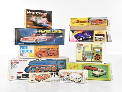 Lot 891 - A collection of ten tinplate toys including...