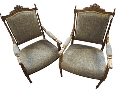 Lot 83 - A pair of reproduction oak French style arm...