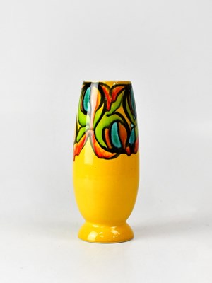 Lot 173 - POOLE POTTERY; a slender yellow 'Delphis' vase,...