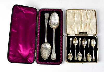 Lot 920 - A near pair of hallmarked silver spoons with...