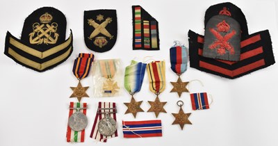 Lot 437 - A set of seven WWII medals awarded to H. A....