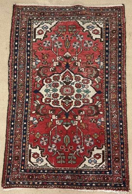 Lot 692 - A Hamadan rug, with central floral medallion...