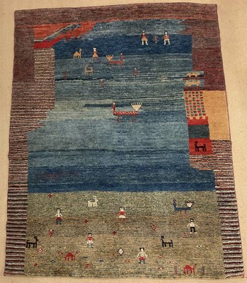 Lot 697 - An unusual woollen rug, with decoration of...