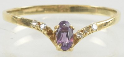 Lot 876 - A 14ct yellow gold amethyst and diamond set...