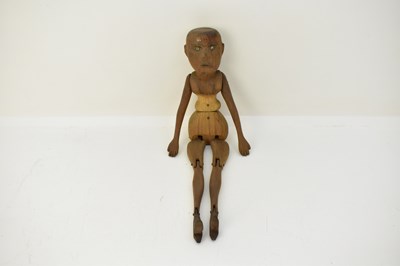 Lot 575 - A 19th century pine articulated doll, with...