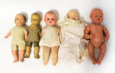 Lot 333 - Four early/mid-20th century dolls with...