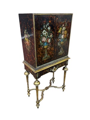 Lot 147 - A Continental cabinet on stand with lacquered...