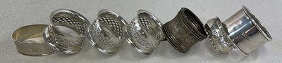 Lot 472 - Seven various hallmarked silver napkin rings,...