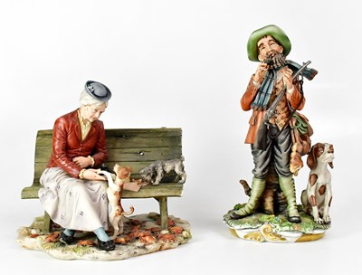 Lot 157 - CAPODIMONTE; two figures, one of an elderly...