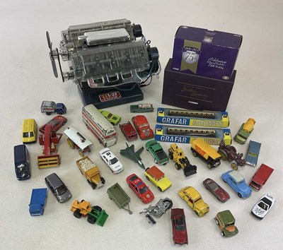 Lot 129 - A collection of playworn vehicles and toys,...