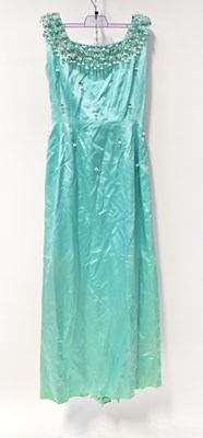 Lot 606 - Three c.1960s full-length evening dresses,...