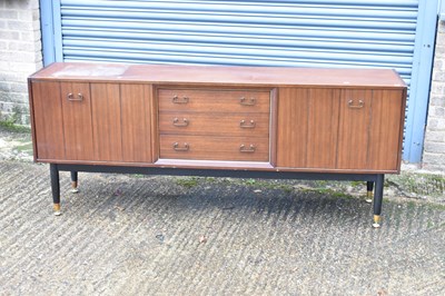 Lot 75A - A mid-century sideboard with three central...