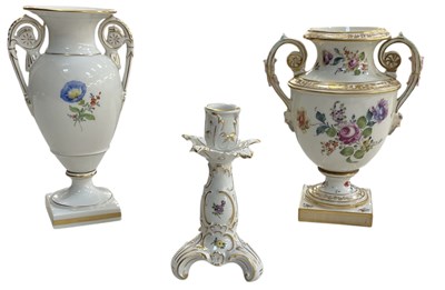 Lot 597 - A Continental hand painted floral decorated...