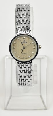 Lot 1037 - OMEGA; a lady's stainless steel quartz...