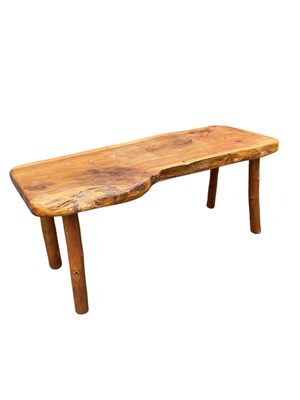 Lot 65 - A Chinese elm low coffee table, length 70cm.