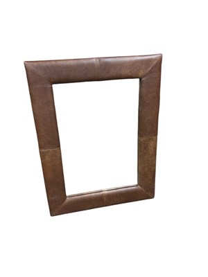 Lot 136 - A modern brown leather effect wall mirror, 119...