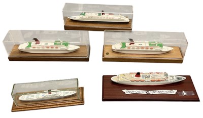 Lot 569 - Five model cruiseliners, four in glass cases,...