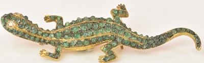 Lot 555 - A yellow and white metal emerald and diamond...