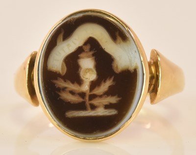 Lot 533 - An 18ct yellow gold signet ring, with engraved...