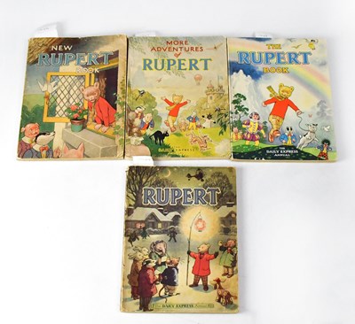 Lot 737 - THE NEW RUPERT BOOK; four paperback books from...