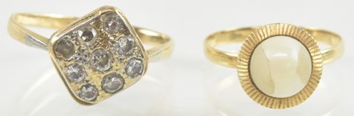 Lot 831 - A yellow metal square head diamond ring, set...