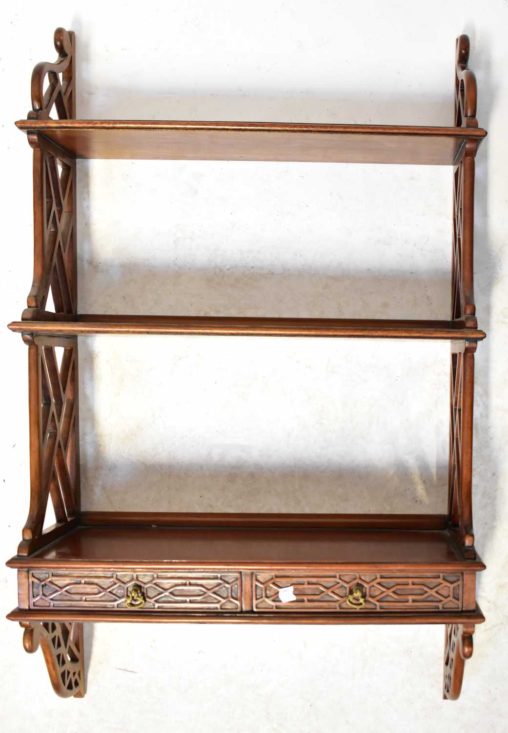 Lot 32 - A mahogany Chippendale-style open wall-hanging...