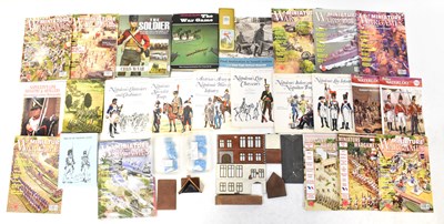 Lot 445 - A quantity of toy and war-related books and...