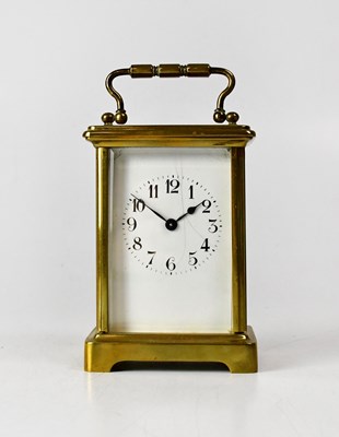 Lot 122 - A brass cased carriage clock, the dial set...