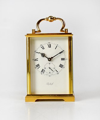 Lot 121 - IMHOP; a brass cased carriage clock, the...