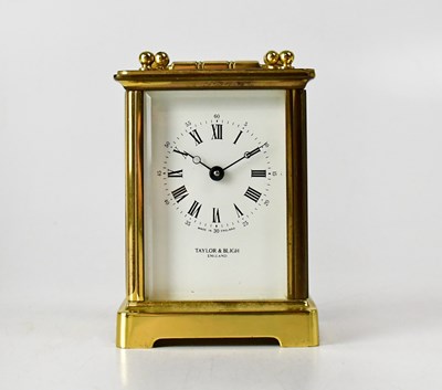 Lot 124 - TAYLOR & BLIGH; a brass cased carriage clock,...