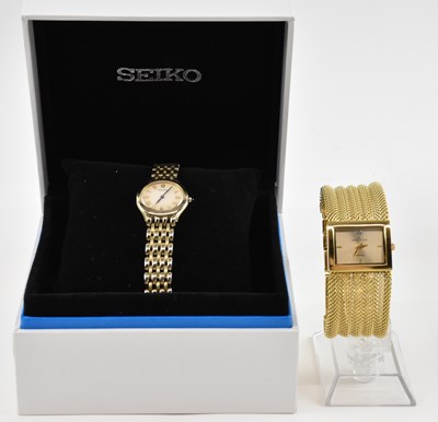 Lot 1036 - SEIKO; a boxed stainless steel lady's...