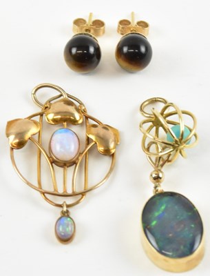 Lot 892 - A 9ct yellow gold opal set Art Nouveau style...