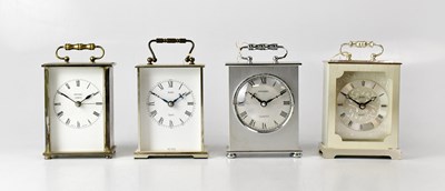 Lot 136 - Four cased chrome-effect modern carriage-style...