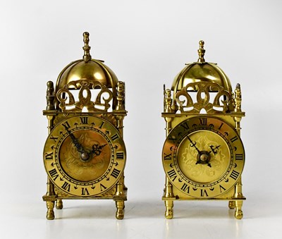 Lot 129 - A pair of reproduction brass cased lantern...