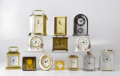 Lot 133 - Thirteen clocks to include carriage-style,...