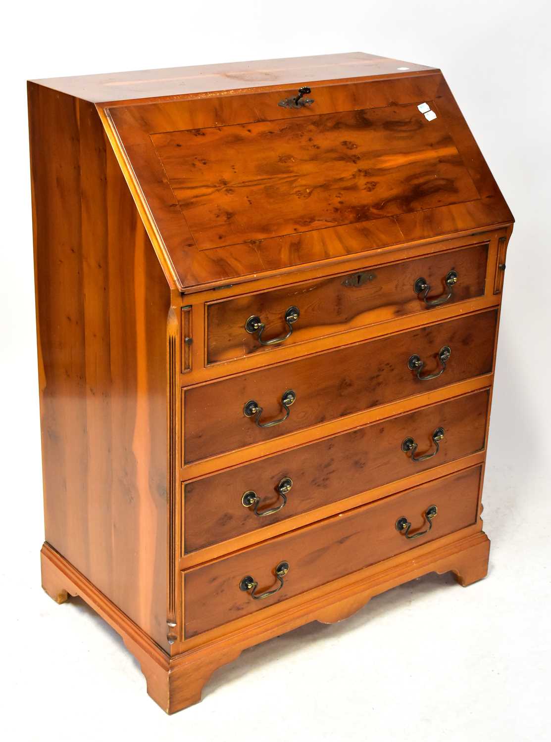 Lot 23 - A Georgian-style yew wood bureau with fall...