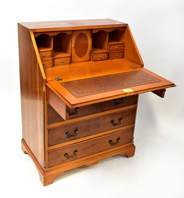 Lot 23 - A Georgian-style yew wood bureau with fall...